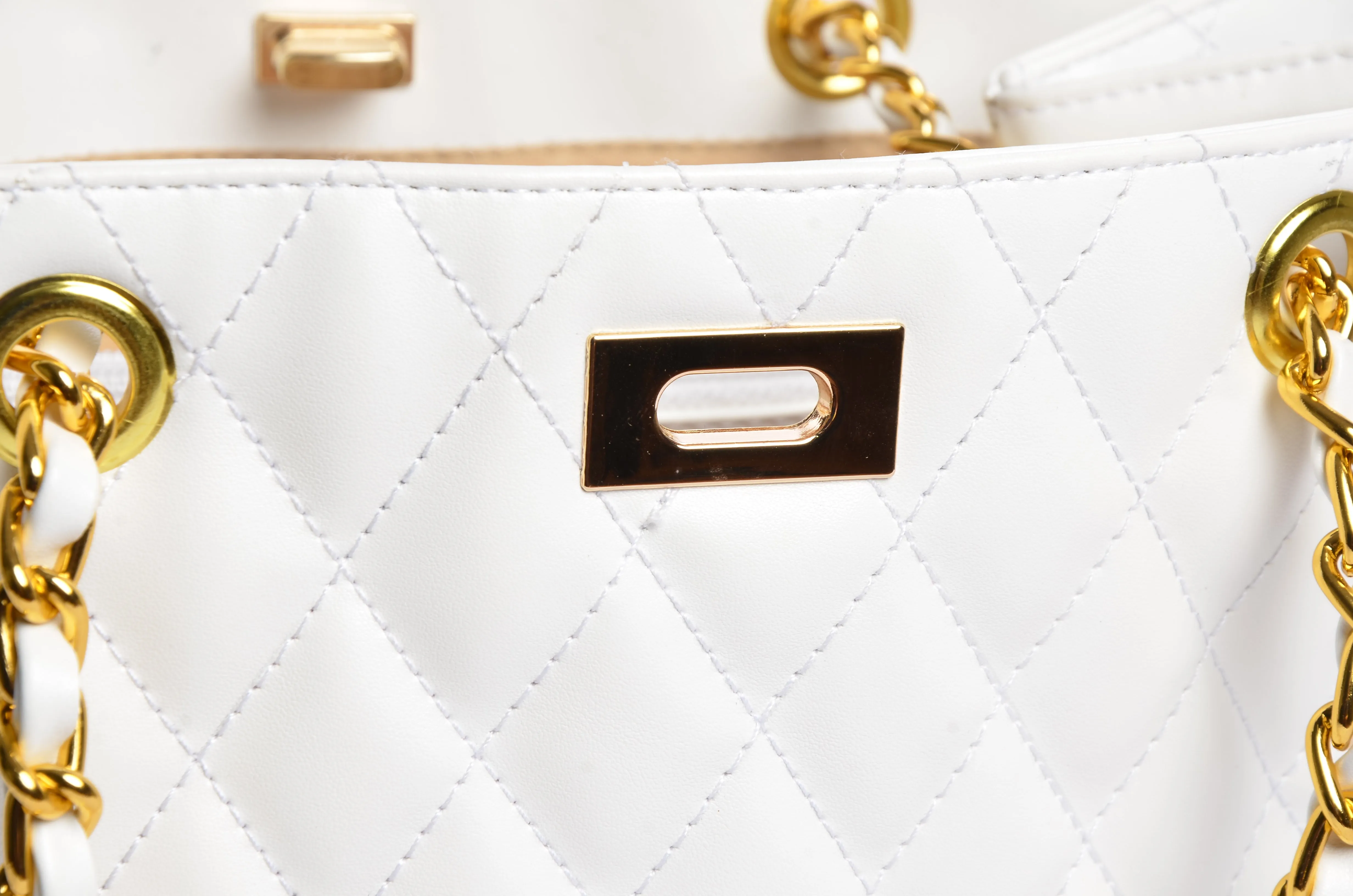 Stylish handbag with gold chain strap