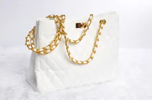 Stylish handbag with gold chain strap